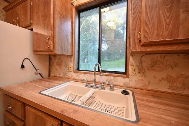 a view of lake with green space