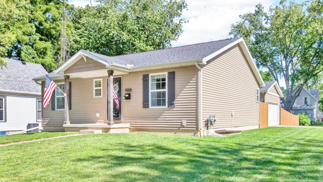 308 East Locust Street Normal, IL 61761 - Photo 1 of 40 a front view of a house with a yard