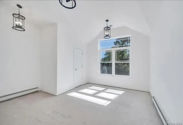 a view of empty room with windows