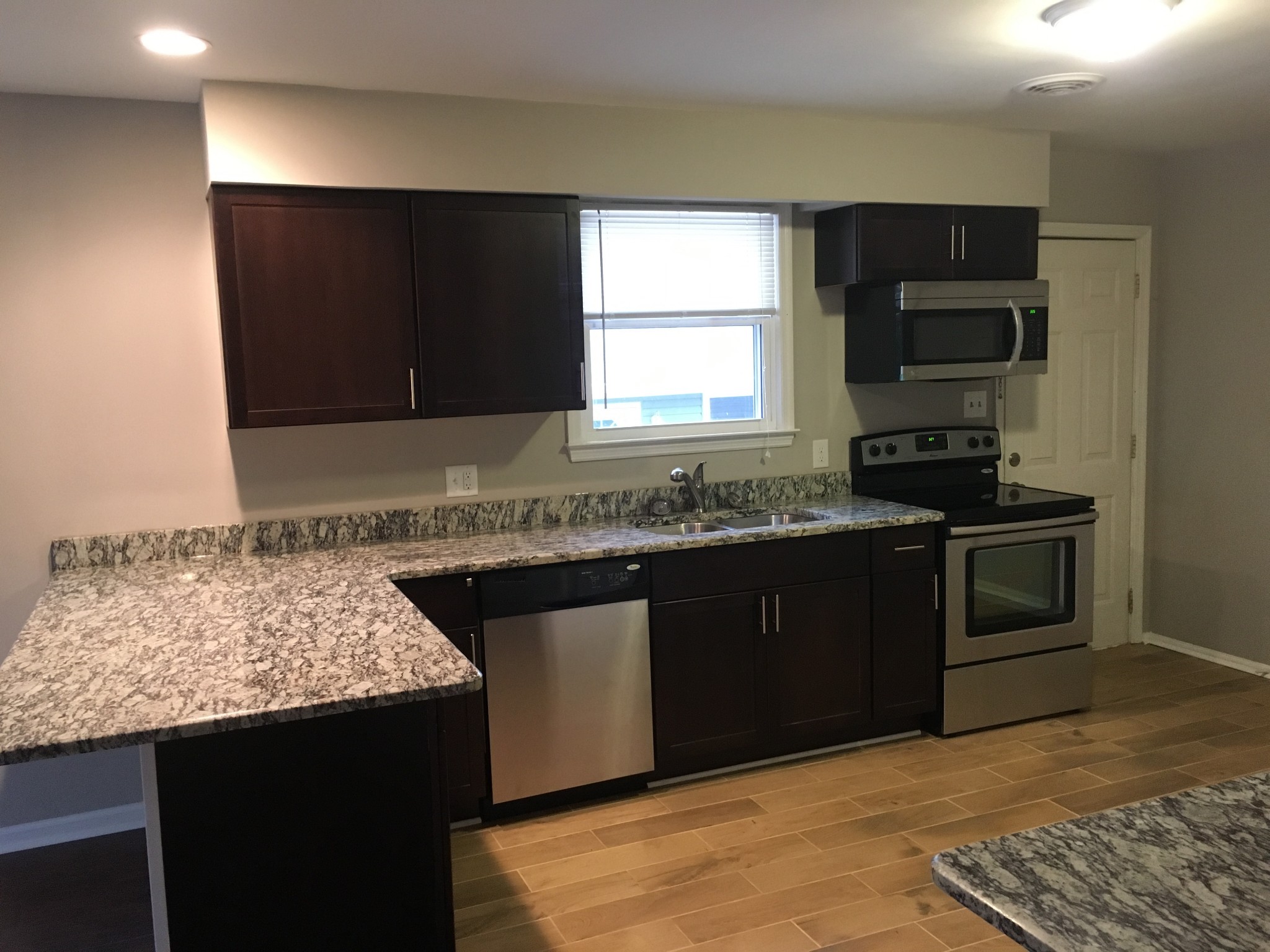 214 Rio Vista Drive Madison, TN 37115 - Photo 2 of 12 a kitchen with a sink stove and microwave