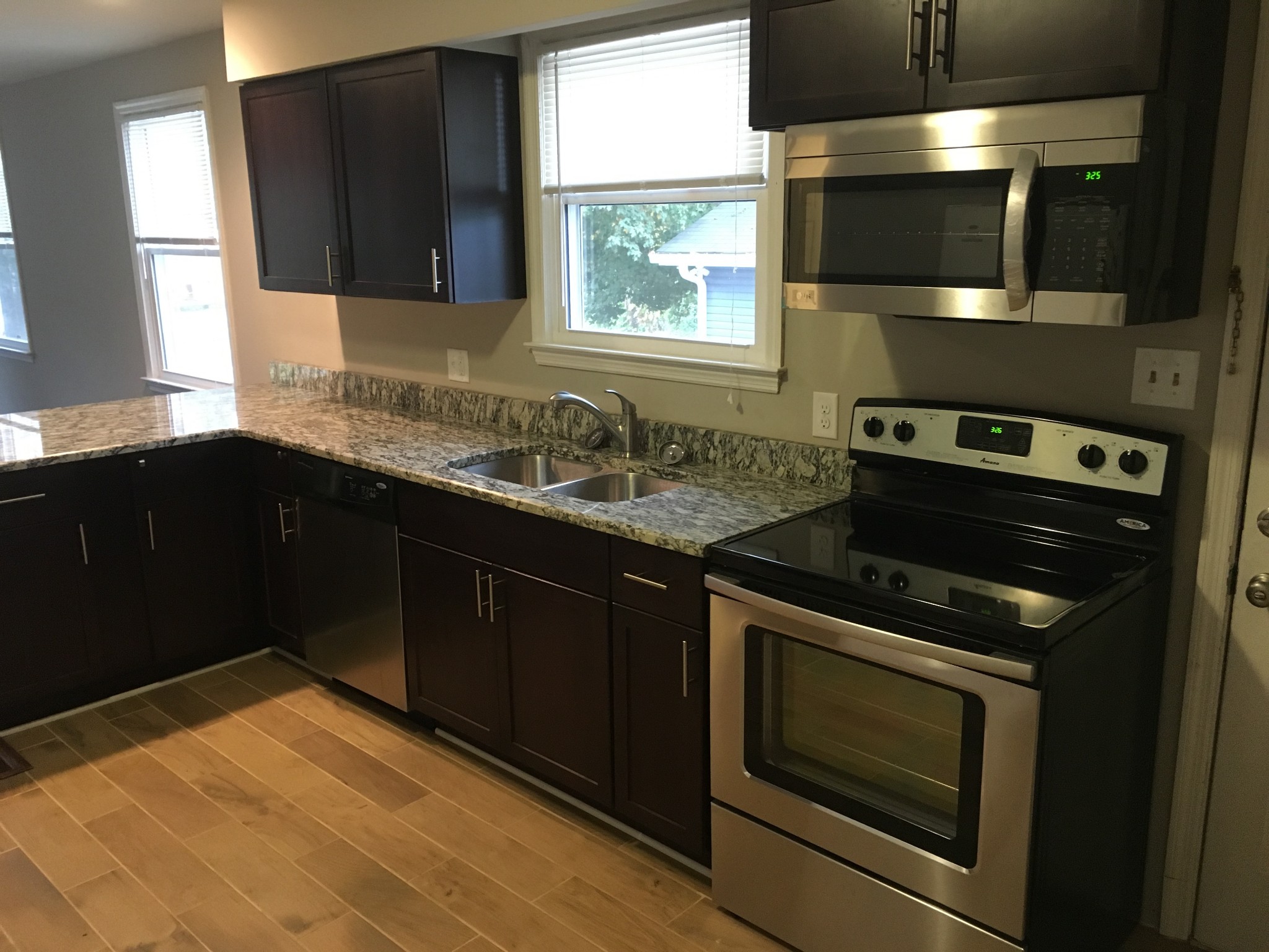 214 Rio Vista Drive Madison, TN 37115 - Photo 3 of 12 a kitchen with a stove and a microwave