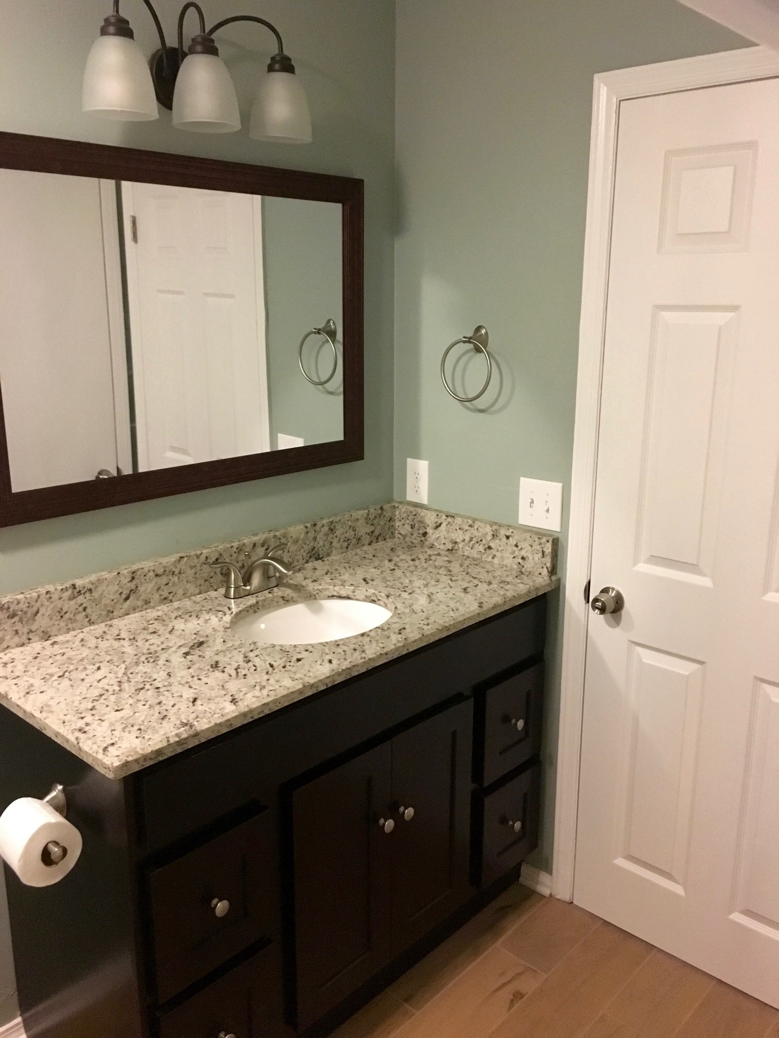214 Rio Vista Drive Madison, TN 37115 - Photo 4 of 12 a bathroom with a granite countertop sink and a mirror