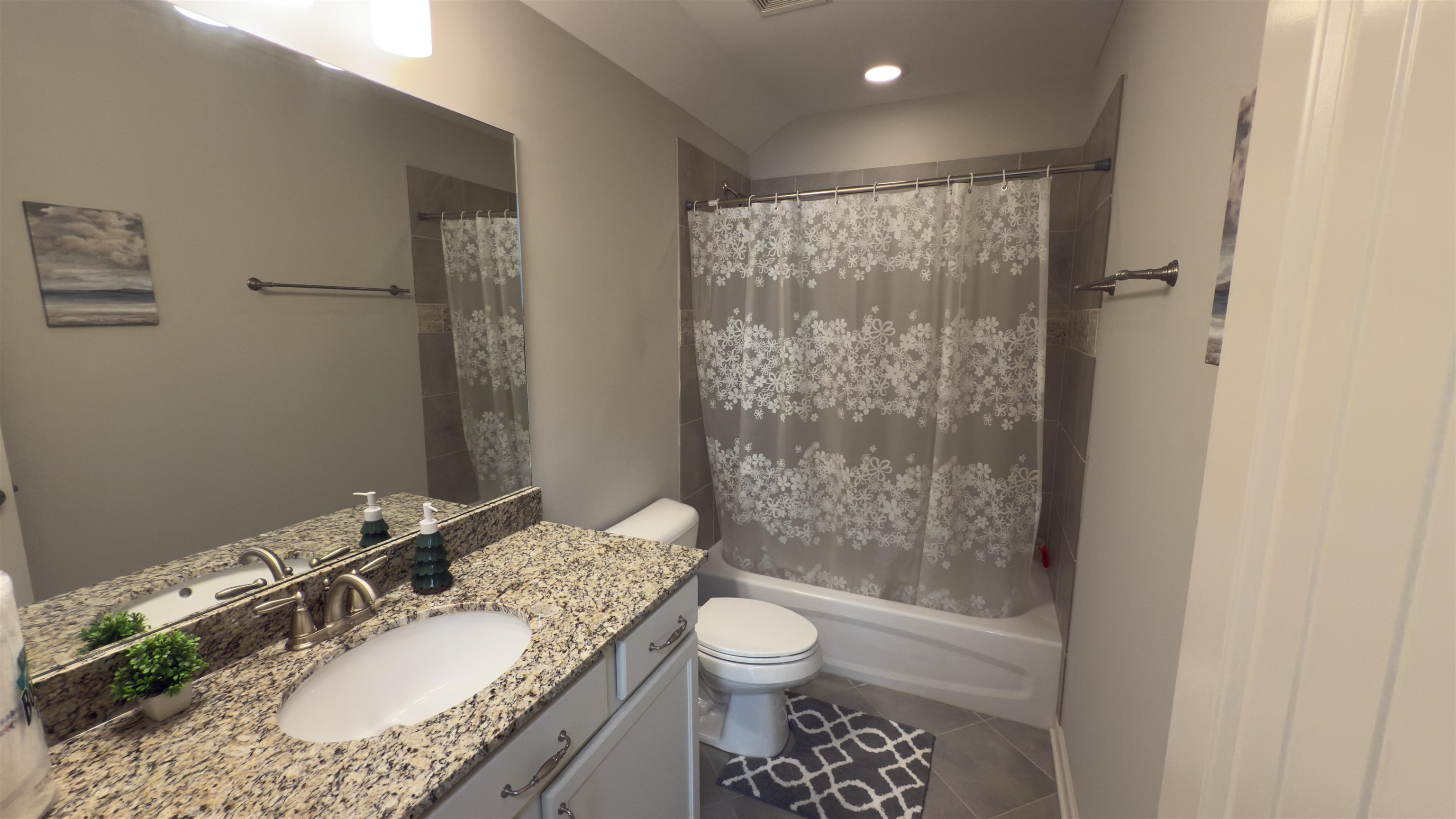 1217 Pilgrim Ridge Road Collierville, TN 38017 - Photo 28 of 33 Bathroom with shower / bath combo, vanity, and tile patterned flooring