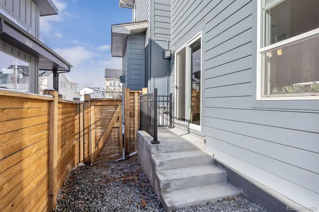 a view of a pathway with a house