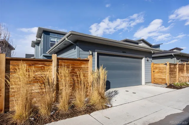 a front view of a house with a garage