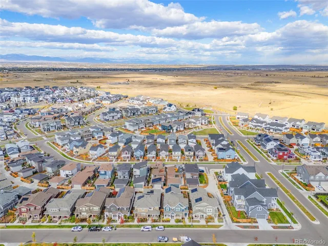 a view of a city with an ocean view