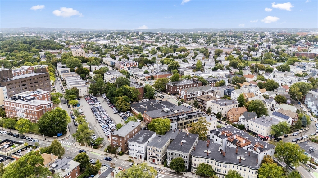1433 Cambridge Street, Unit 1 Cambridge, MA 02139 - Photo 13 of 14 an aerial view of a city with lots of residential buildings