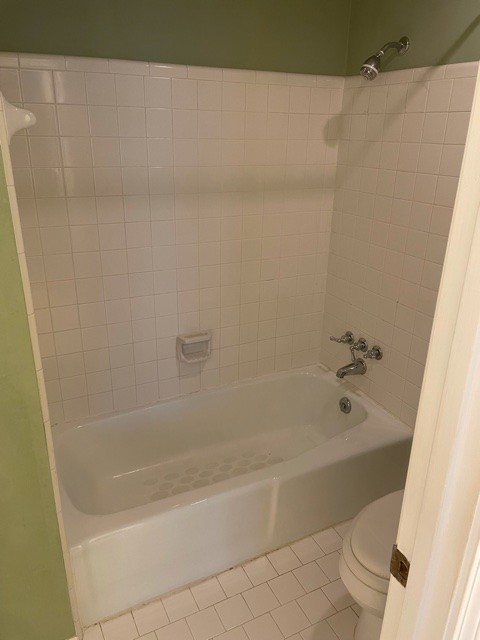 758 Kent Road Nashville, TN 37214 - Photo 12 of 21 a bath tub sitting next to a white sink and vanity