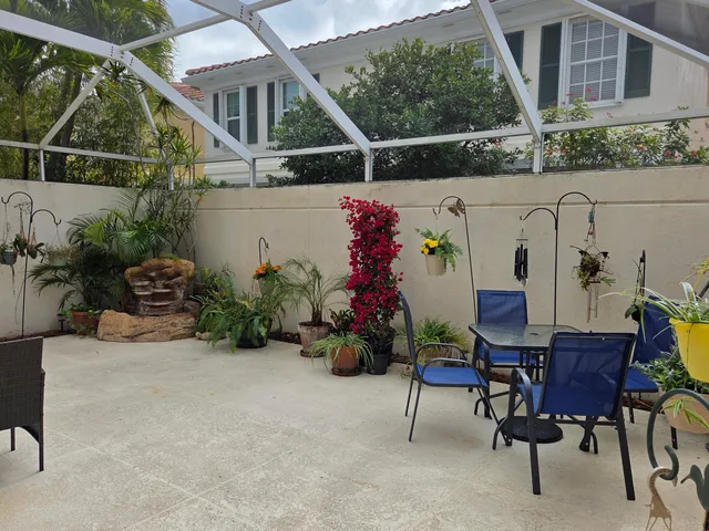 a view of an chairs and tables in the balcony