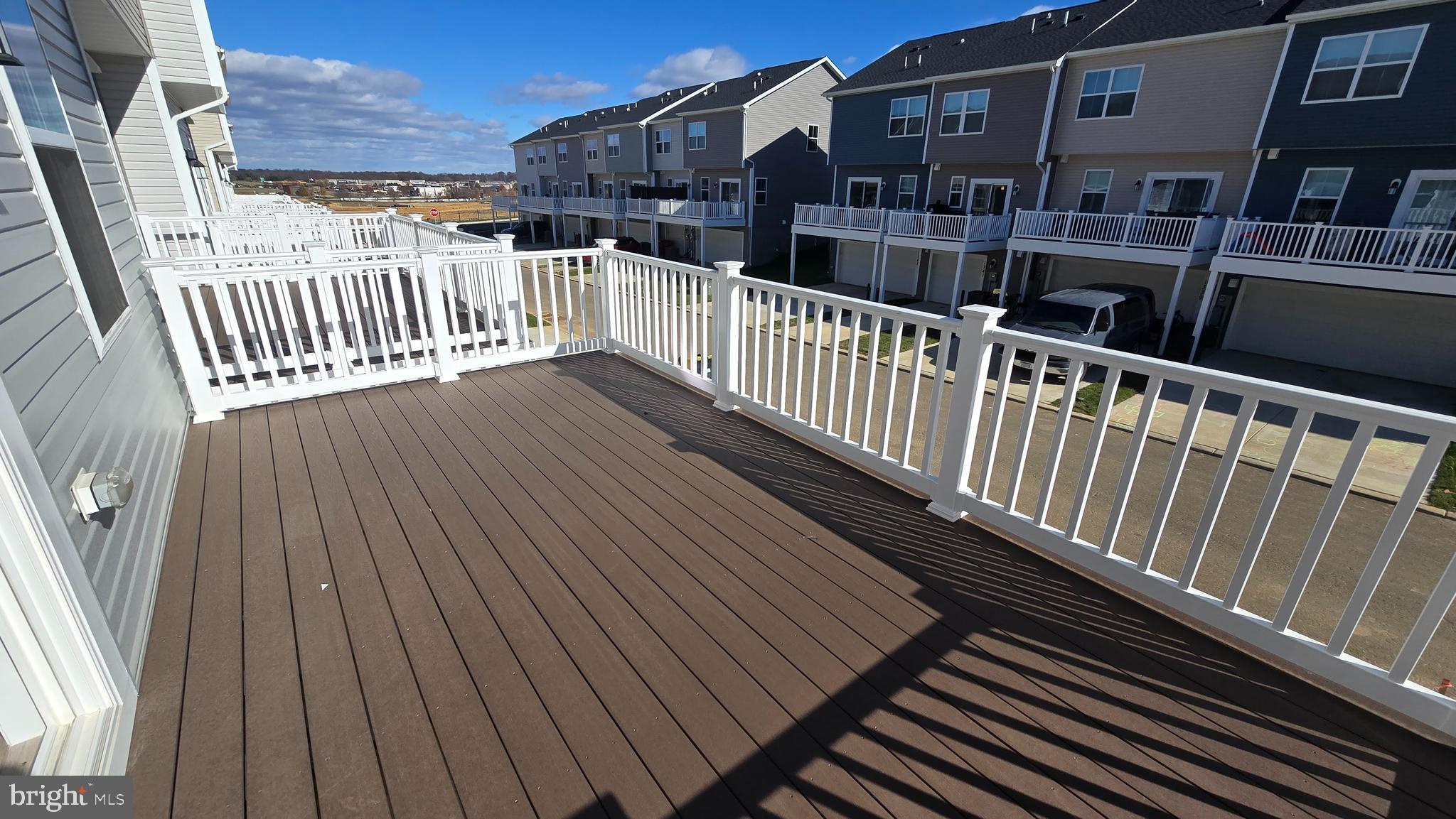1344 Red Clover Lane Ranson, WV 25438 - Photo 2 of 31 a view of balcony with wooden floor