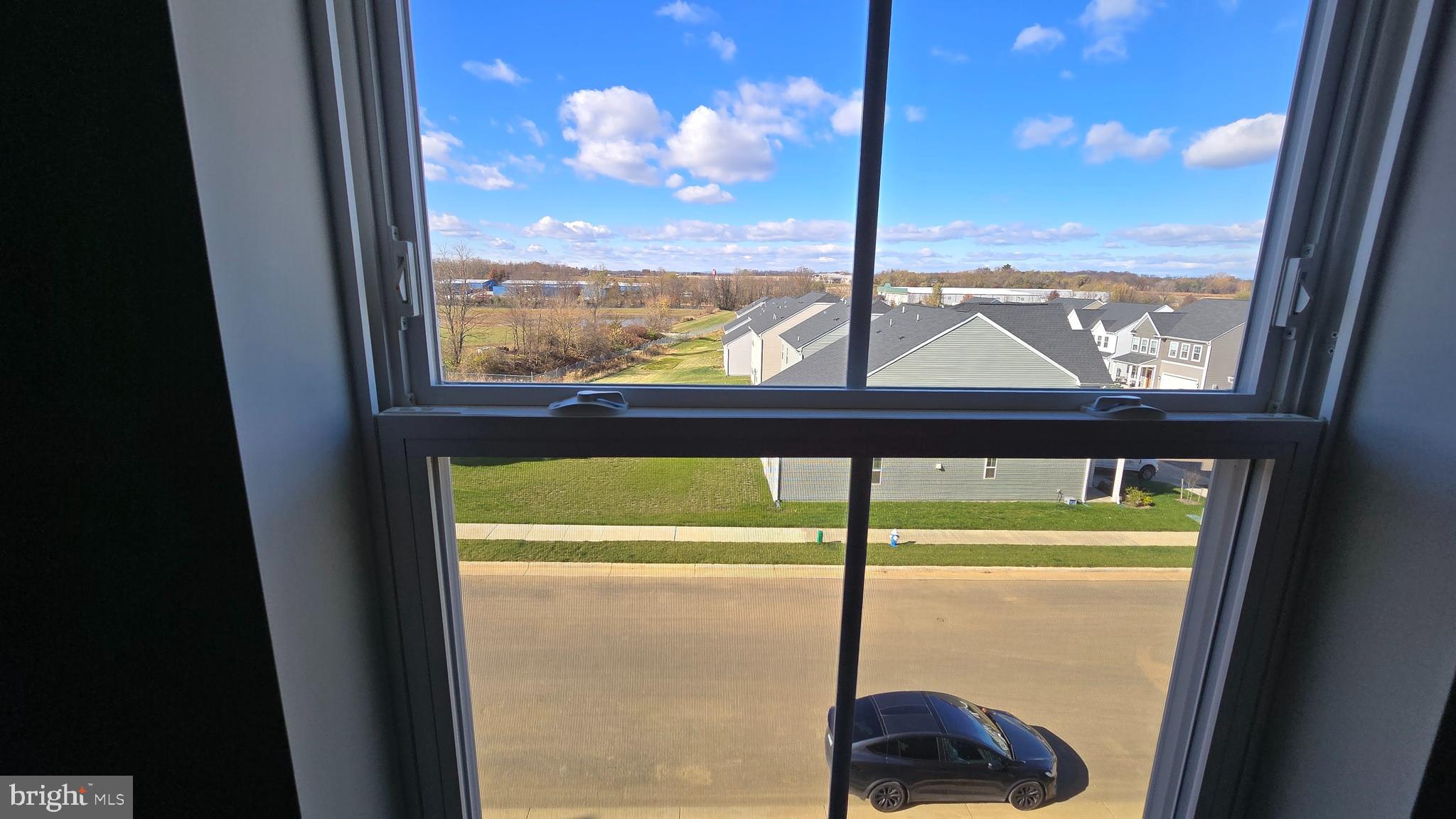 1344 Red Clover Lane Ranson, WV 25438 - Photo 25 of 31 a window with an outdoor view