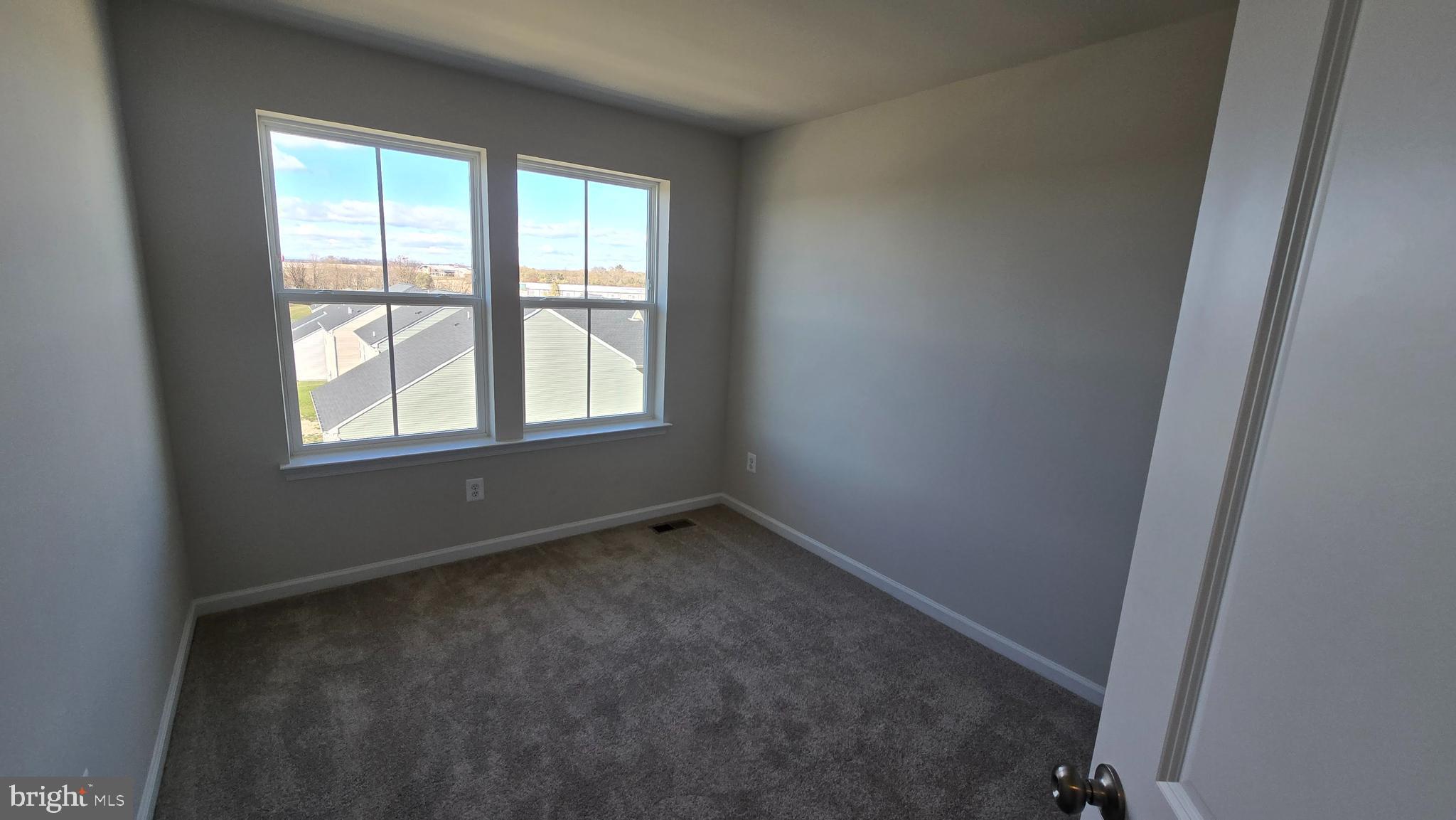 1344 Red Clover Lane Ranson, WV 25438 - Photo 26 of 31 an empty room with a window