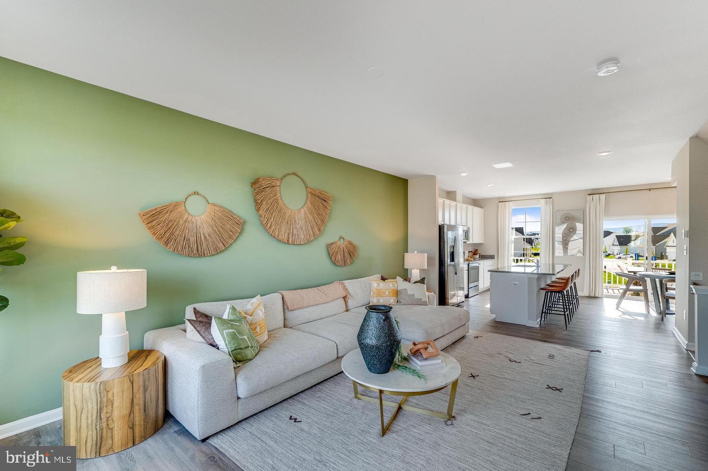 1344 Red Clover Lane Ranson, WV 25438 - Photo 7 of 31 a living room with furniture and a wooden floor