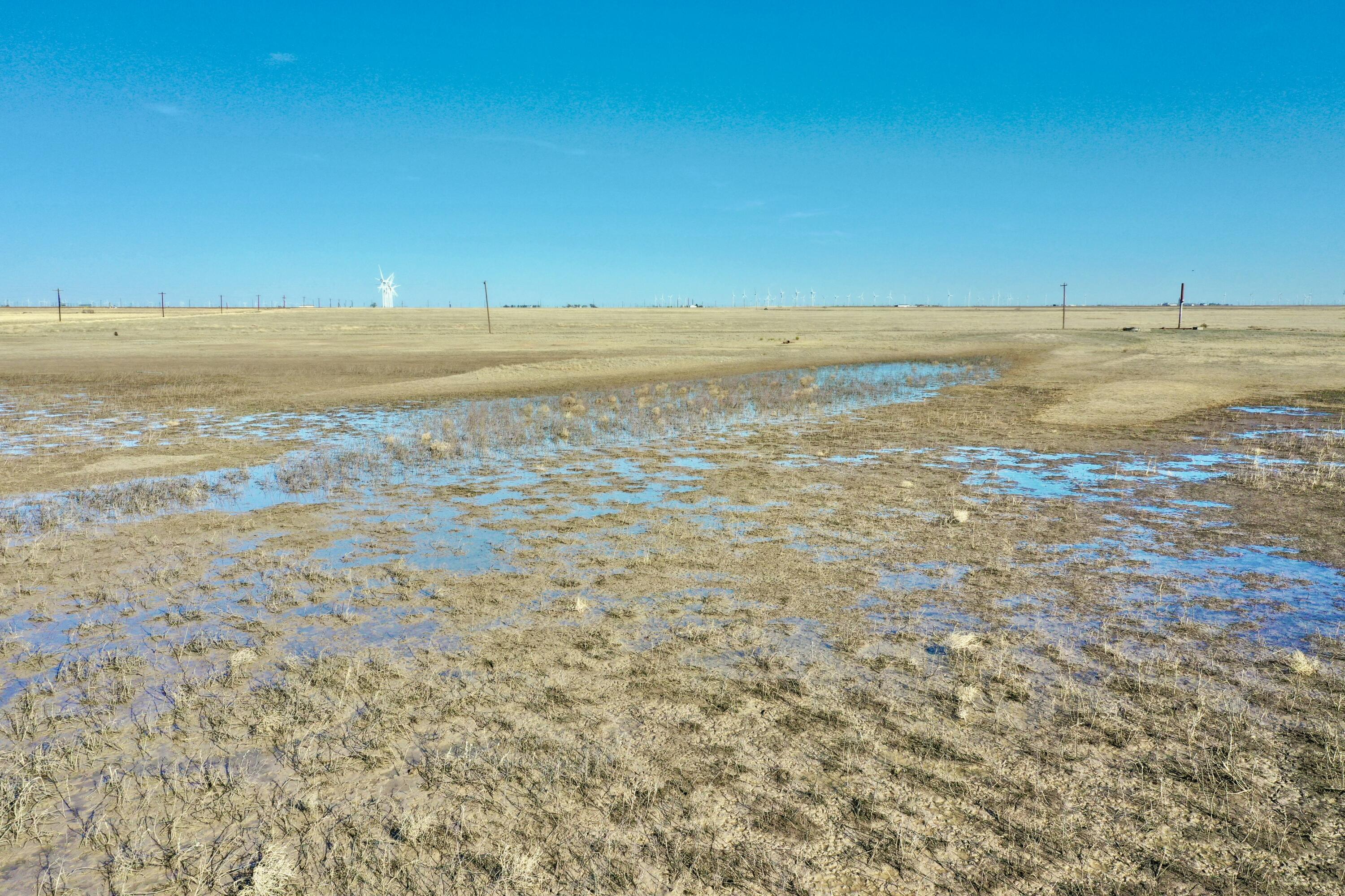 72 Co Road Lockney, TX 79241 - Photo 9 of 20 a view of an ocean and beach