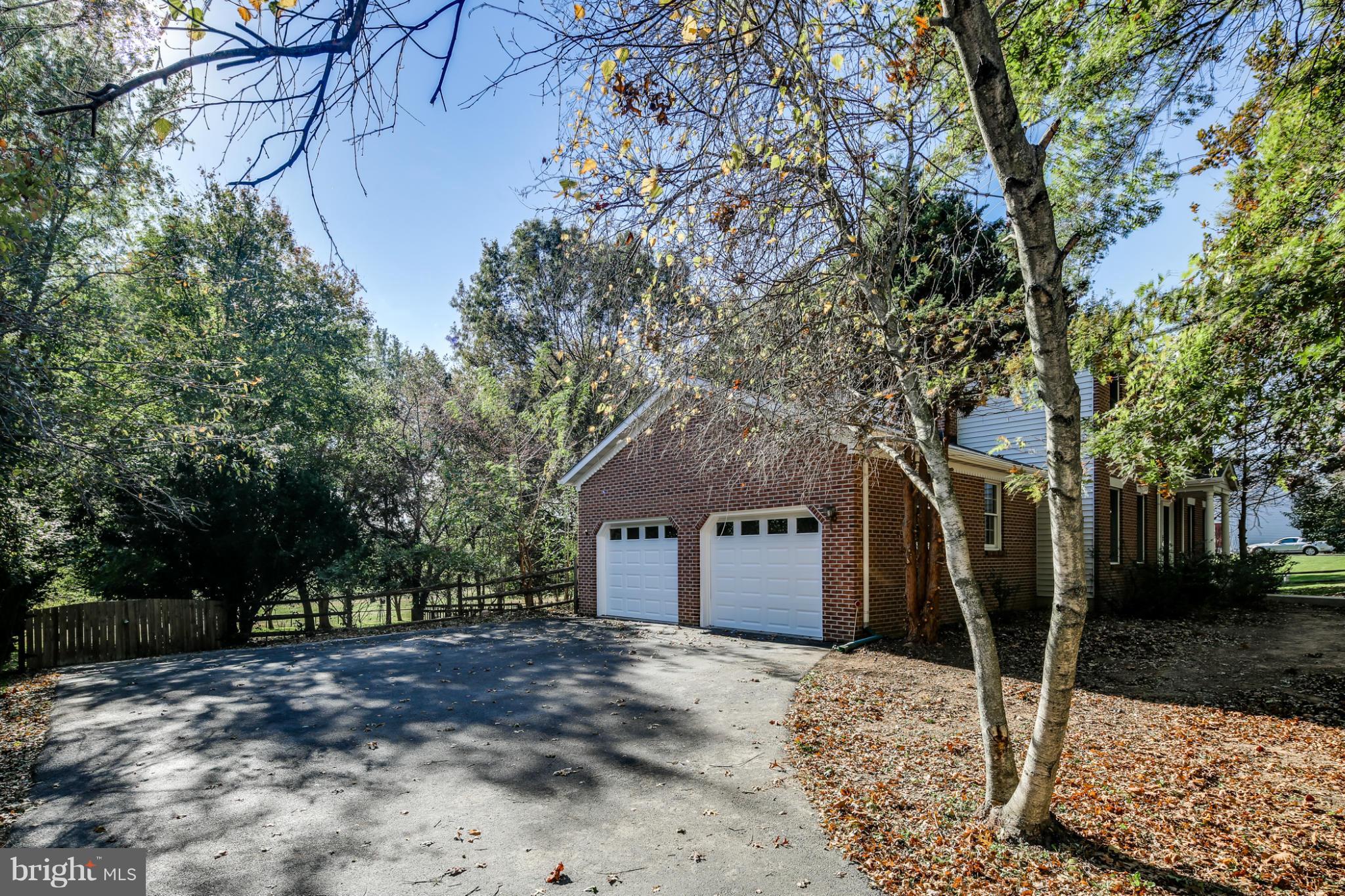 695 Streaker Road Sykesville, MD 21784 - Photo 2 of 24 Brand-new garage doors, access to large backyard.