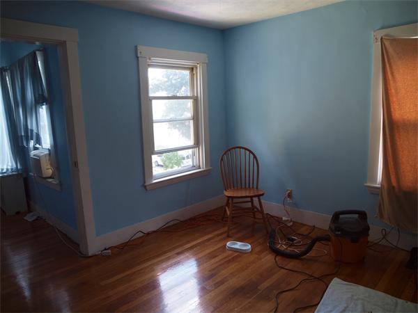 39 Avon Street Somerville, MA 02143 - Photo 13 of 16 a view of a workspace with furniture and a window