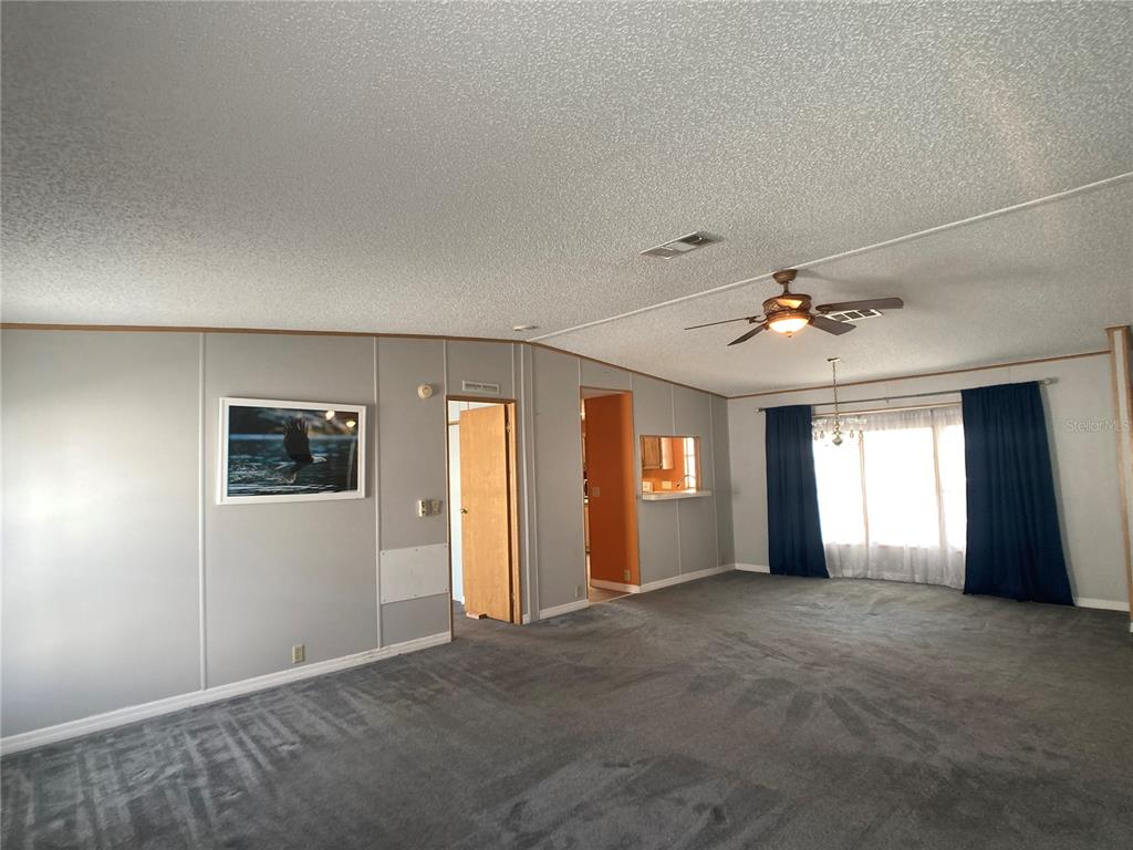 1710 7th Street Southwest, Unit 85 Ruskin, FL 33570 - Photo 12 of 28 a view of an empty room with a window