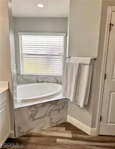 a bathroom with bathtub