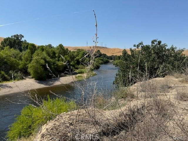 13300 Round Mountain Road Bakersfield, CA 93308 - Photo 3 of 13 a view of a field with a tree