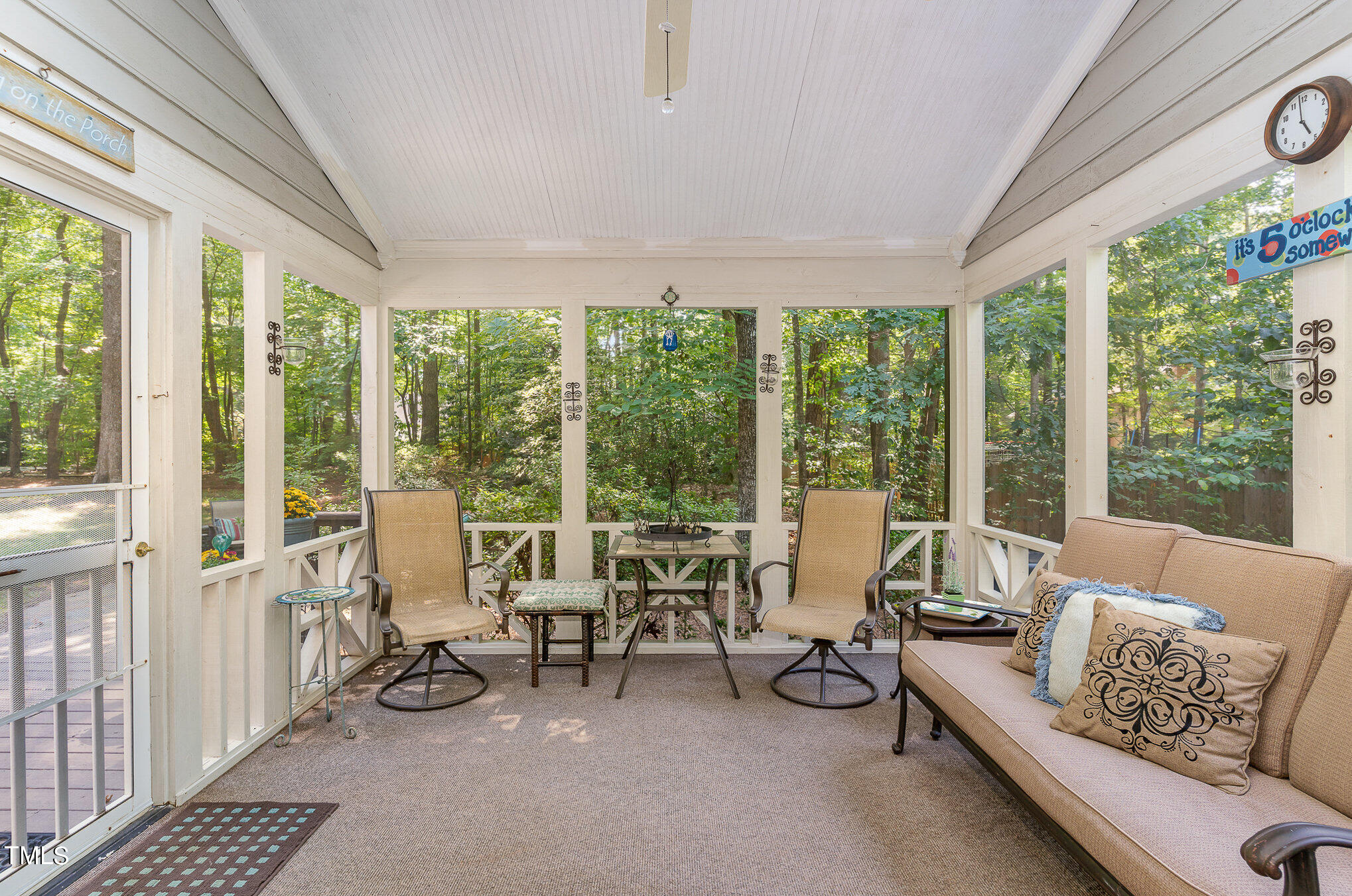 109 Lochfield Drive Cary, NC 27518 - Photo 14 of 43 a living room with furniture and floor to ceiling windows