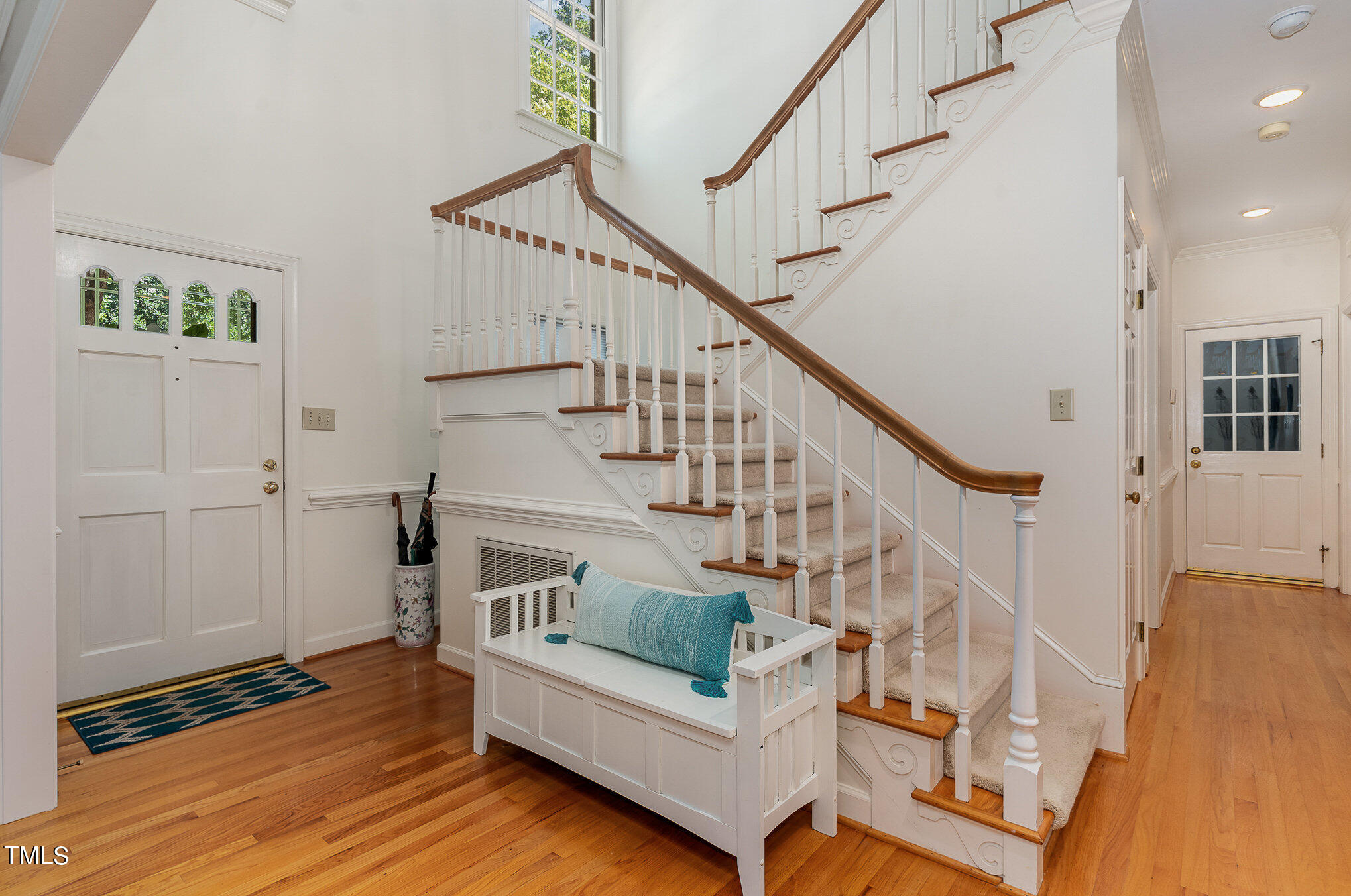 109 Lochfield Drive Cary, NC 27518 - Photo 17 of 43 a view of entryway and hall with wooden floor