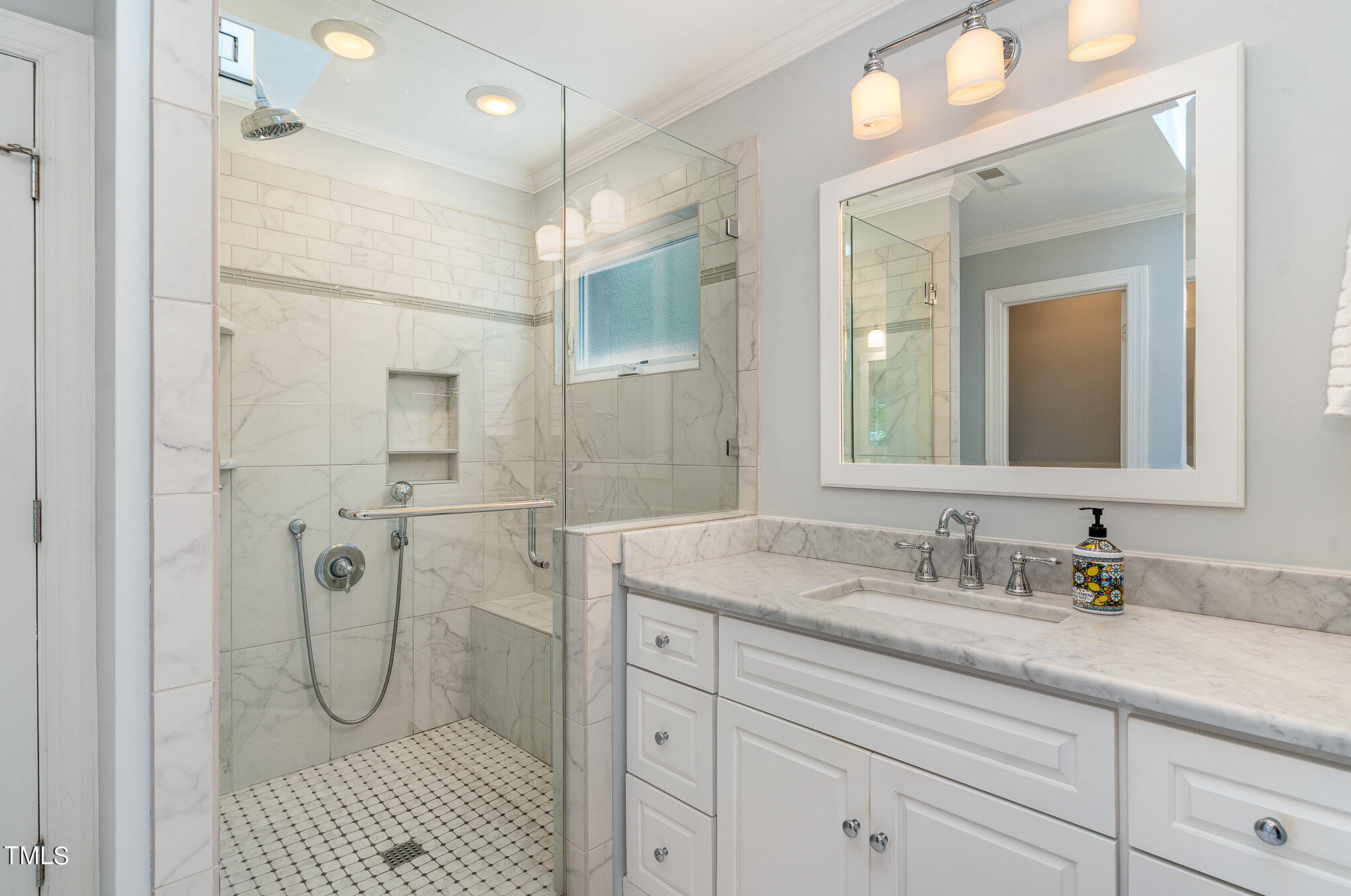 109 Lochfield Drive Cary, NC 27518 - Photo 19 of 43 a bathroom with a granite countertop sink two mirror and shower