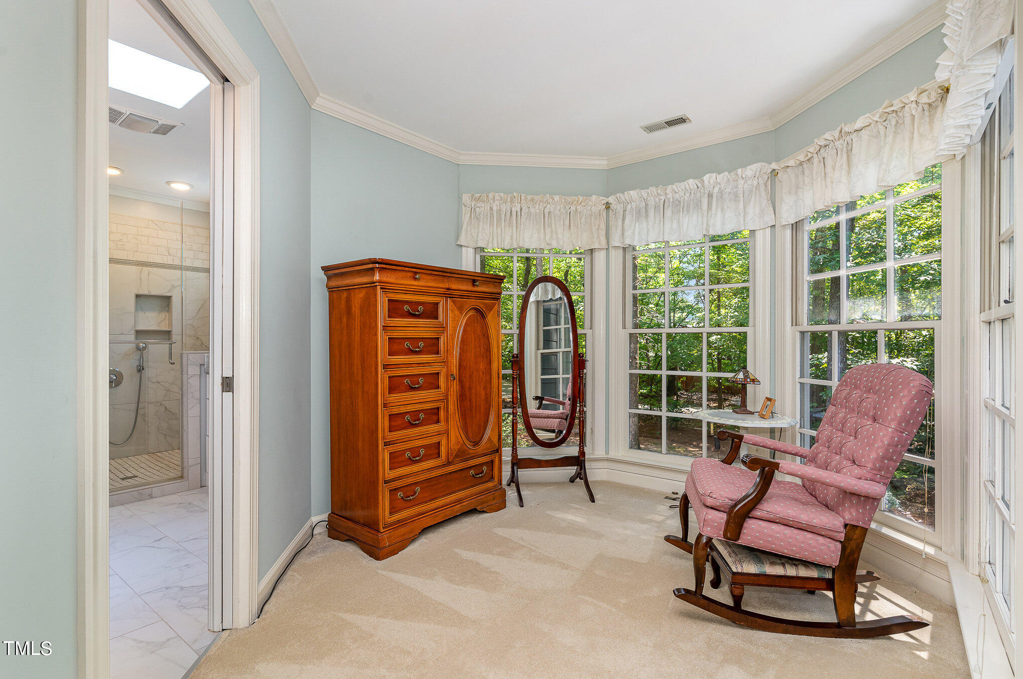 109 Lochfield Drive Cary, NC 27518 - Photo 21 of 43 a living room with furniture and a window