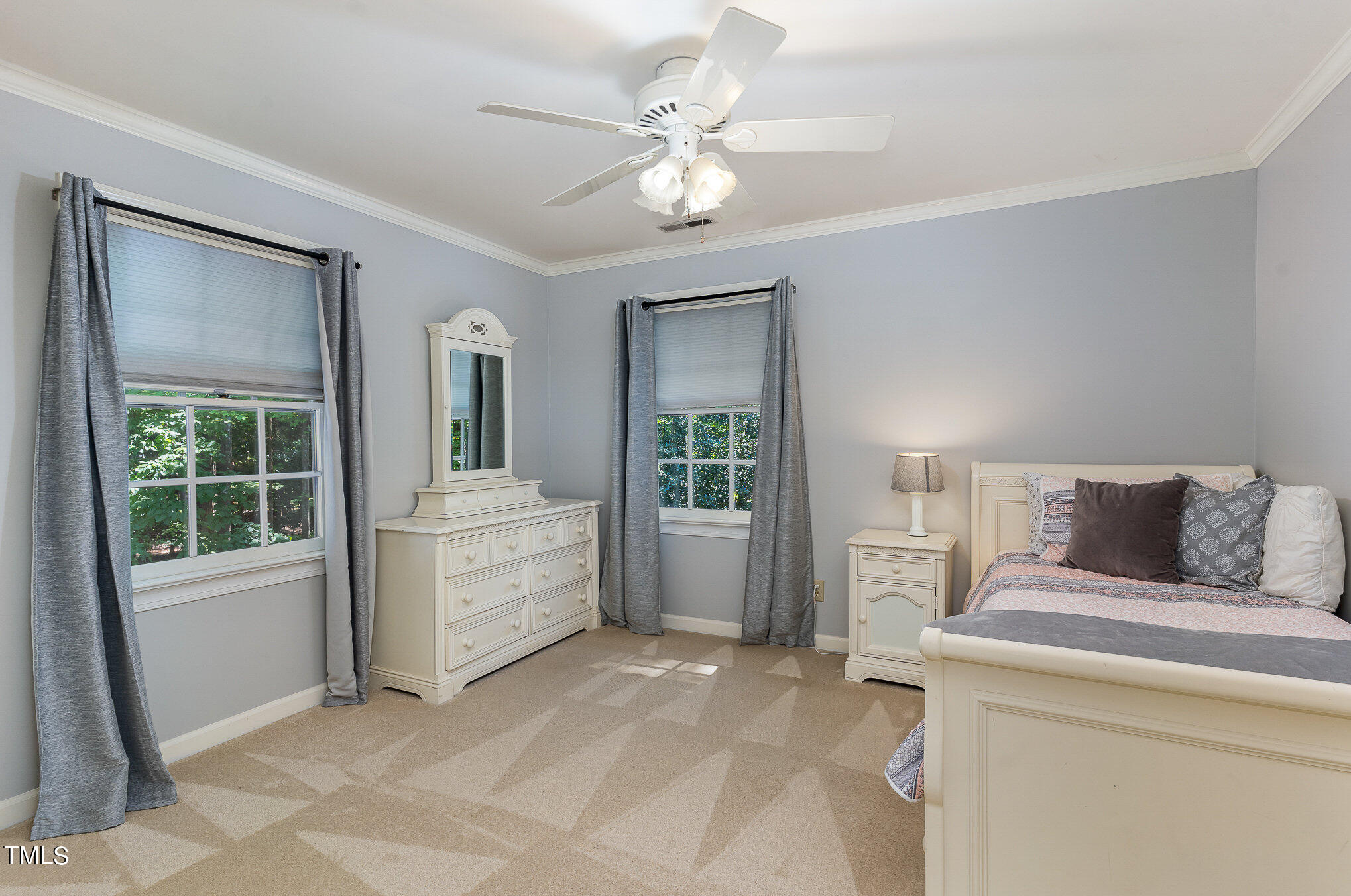 109 Lochfield Drive Cary, NC 27518 - Photo 22 of 43 a living room with furniture and a large window