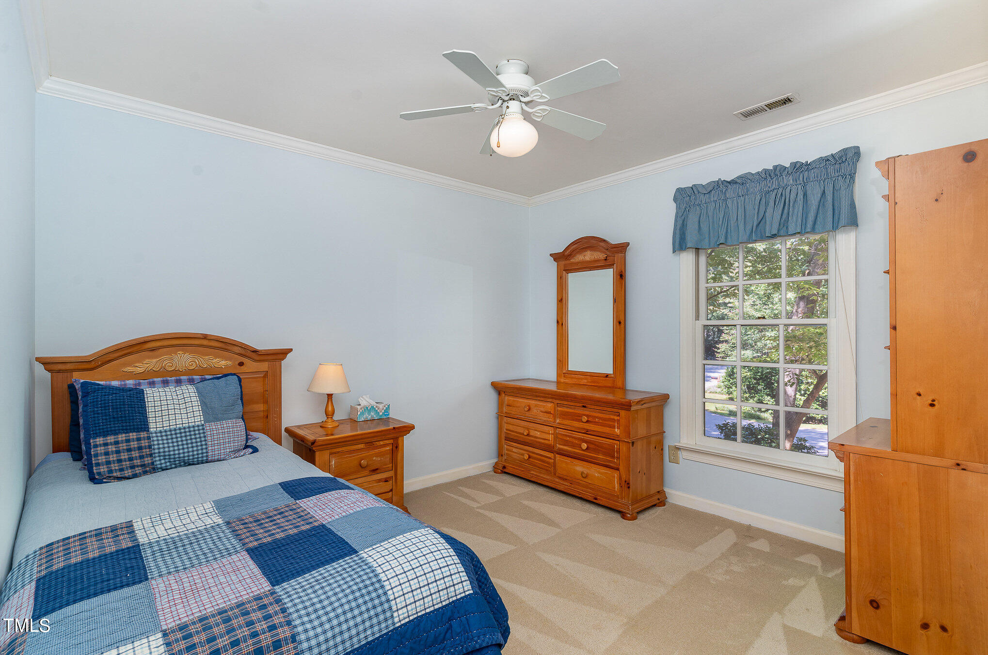 109 Lochfield Drive Cary, NC 27518 - Photo 23 of 43 a bedroom with furniture and window