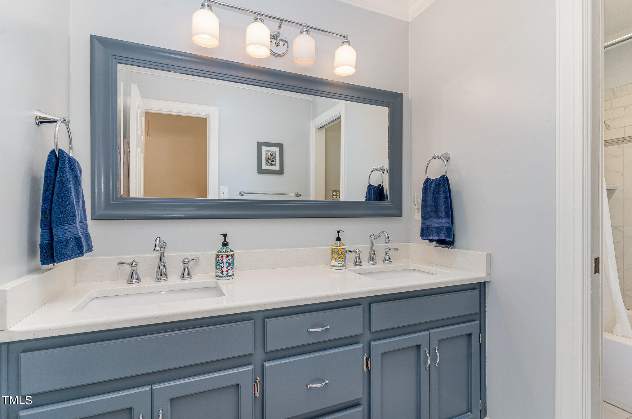 109 Lochfield Drive Cary, NC 27518 - Photo 24 of 43 a bathroom with a sink vanity and mirror