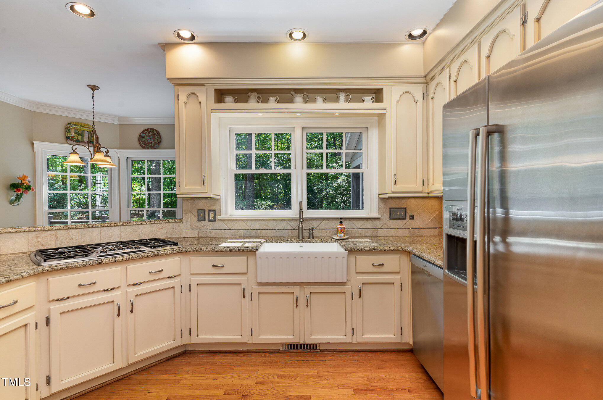 109 Lochfield Drive Cary, NC 27518 - Photo 3 of 43 a kitchen with a sink stove and refrigerator