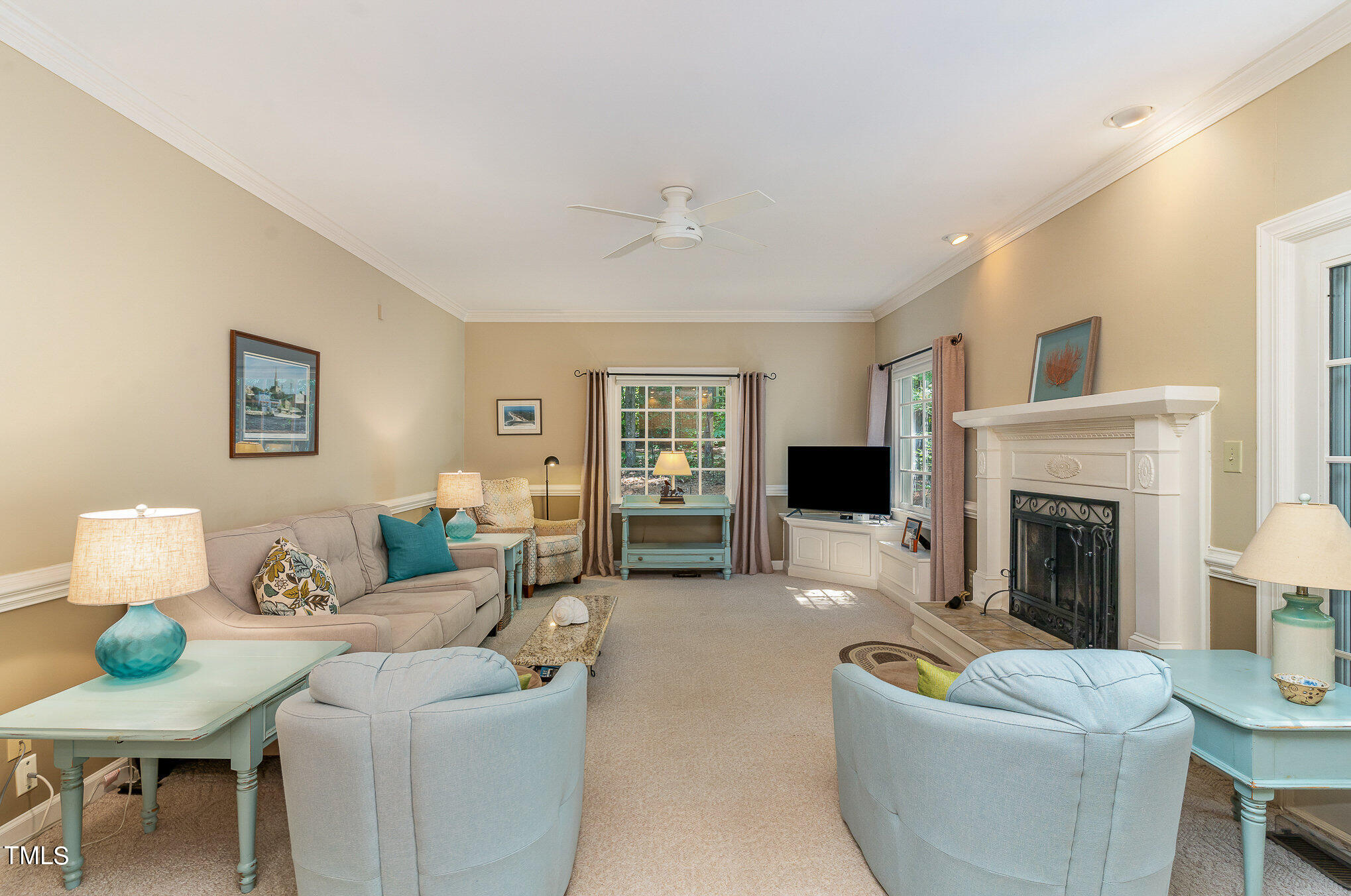 109 Lochfield Drive Cary, NC 27518 - Photo 6 of 43 a living room with furniture and a fireplace