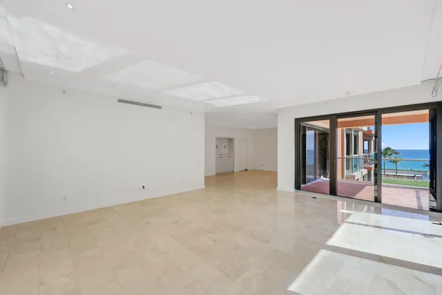 a view of a room that has a large window