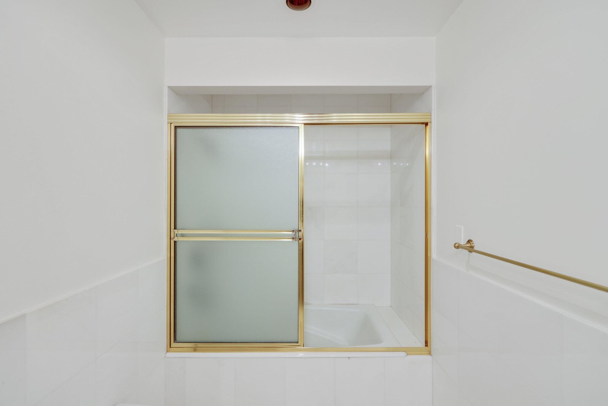 2 North Breakers Row, Unit S32 Palm Beach, FL 33480 - Photo 40 of 77 a bathroom with a glass shower door