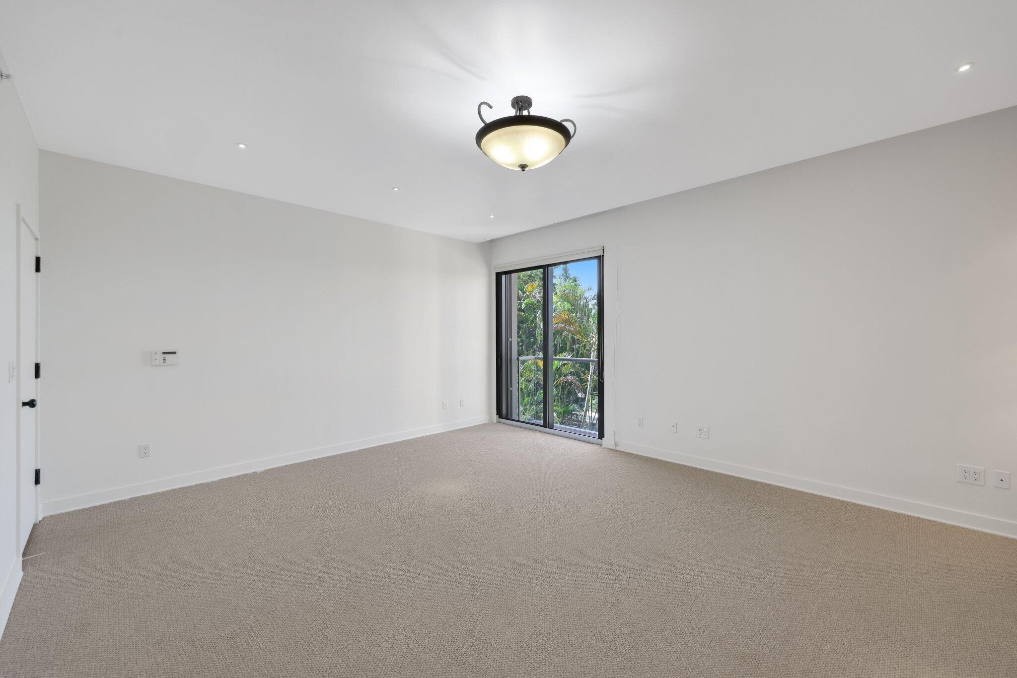 2 North Breakers Row, Unit S32 Palm Beach, FL 33480 - Photo 48 of 77 a view of an empty room with a window
