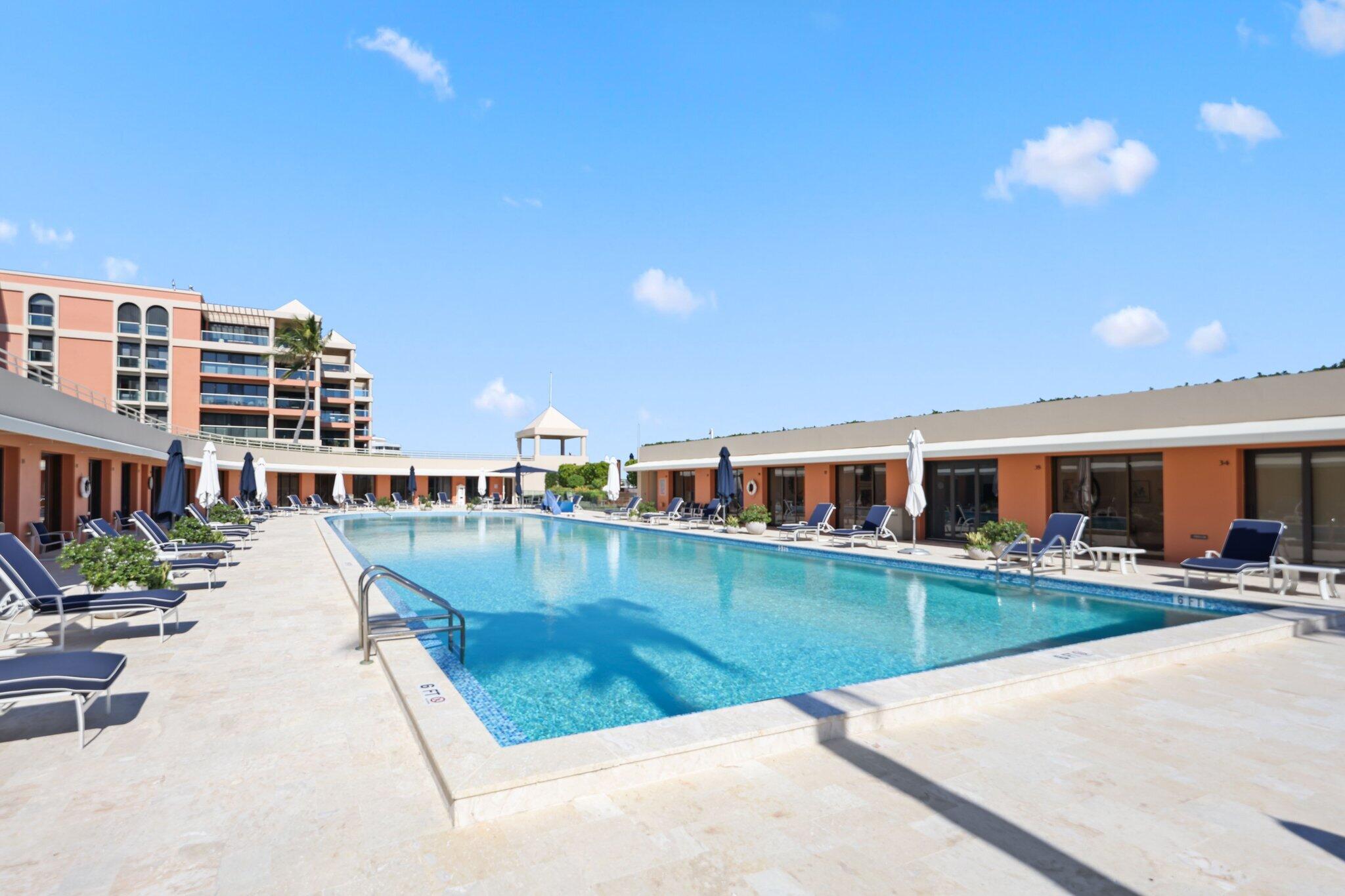 2 North Breakers Row, Unit S32 Palm Beach, FL 33480 - Photo 62 of 77 a view of a swimming pool with a patio