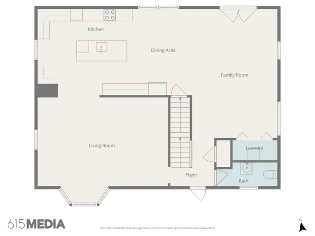 a living room with furniture a large window and a flat screen tv