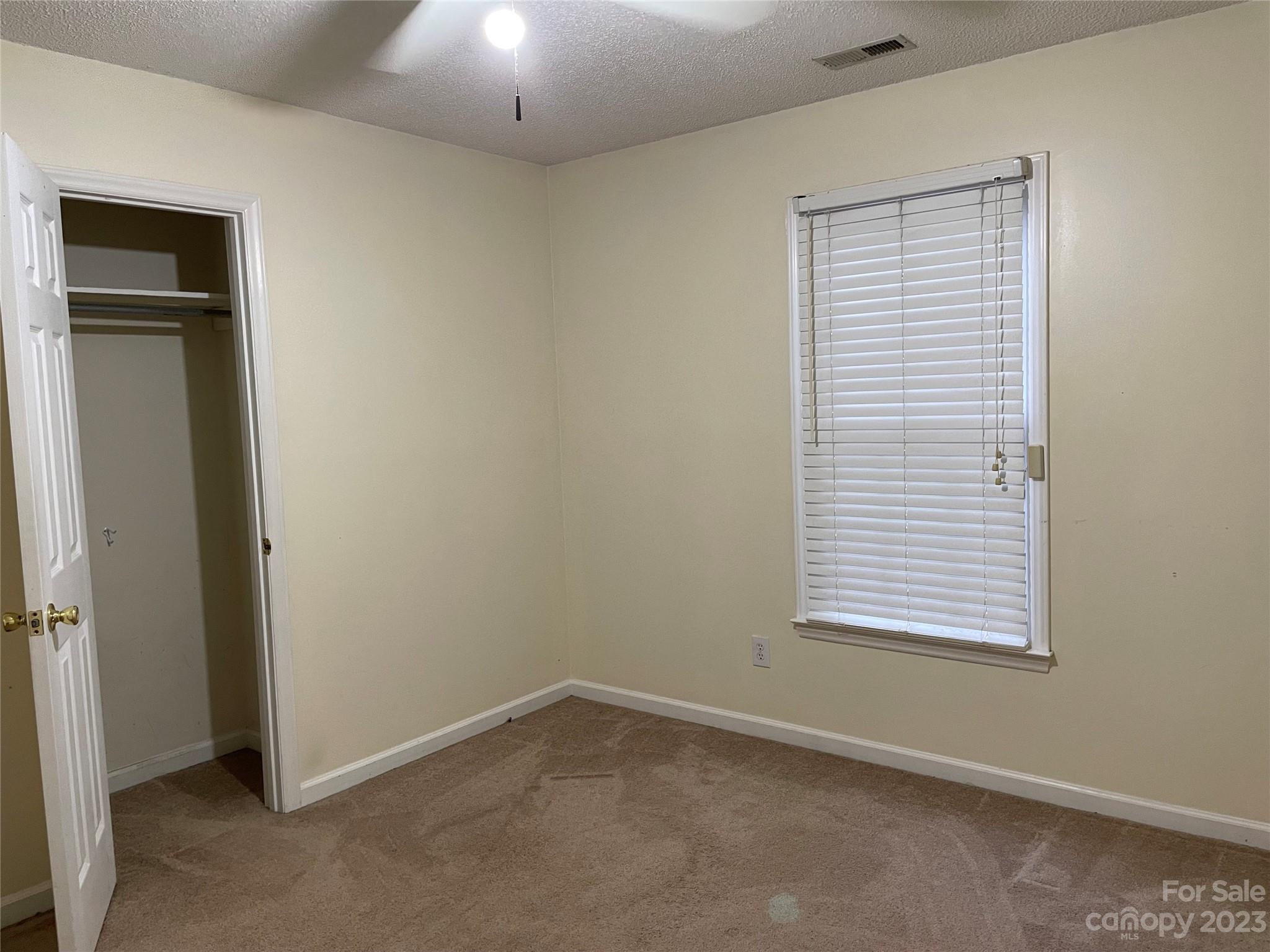 3885 Taxahaw Road Lancaster, SC 29720 - Photo 11 of 18 an empty room with a window