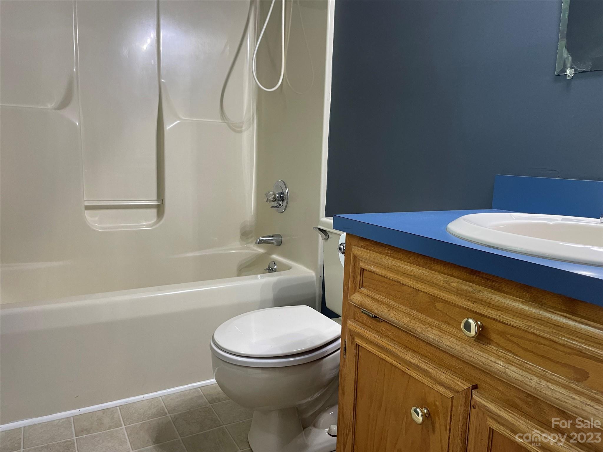 3885 Taxahaw Road Lancaster, SC 29720 - Photo 15 of 18 a bathroom with a sink a toilet and shower