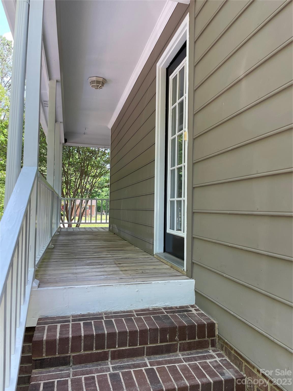 3885 Taxahaw Road Lancaster, SC 29720 - Photo 17 of 18 a view of a house with a door and wooden floor
