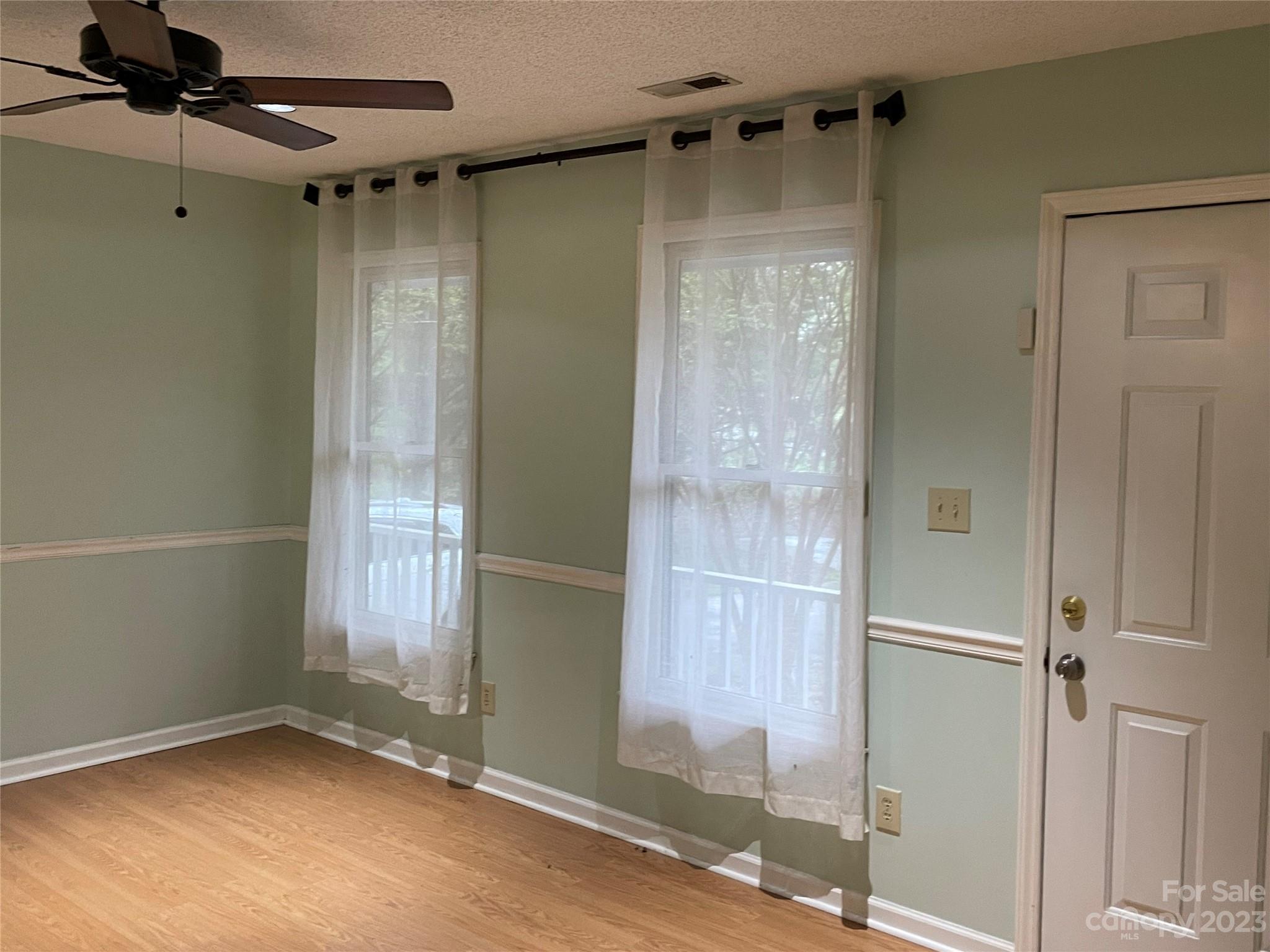3885 Taxahaw Road Lancaster, SC 29720 - Photo 2 of 18 a bathroom with a glass door shower