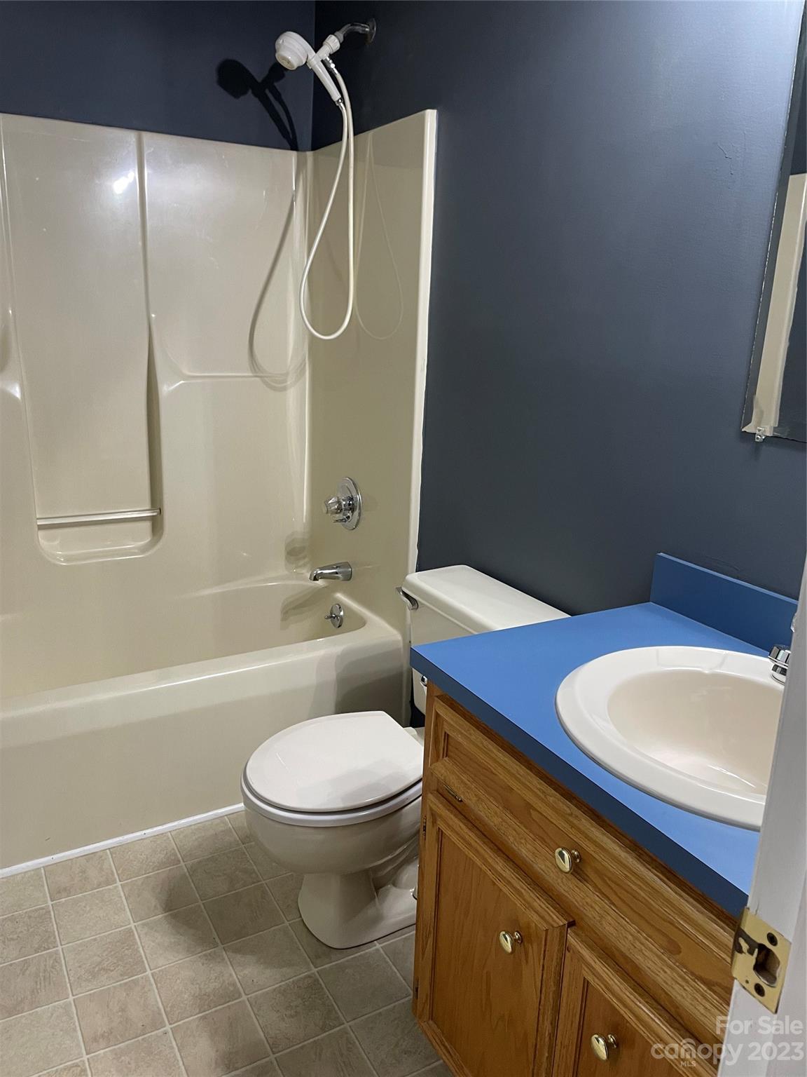 3885 Taxahaw Road Lancaster, SC 29720 - Photo 9 of 18 a bathroom with a toilet a sink and bathtub