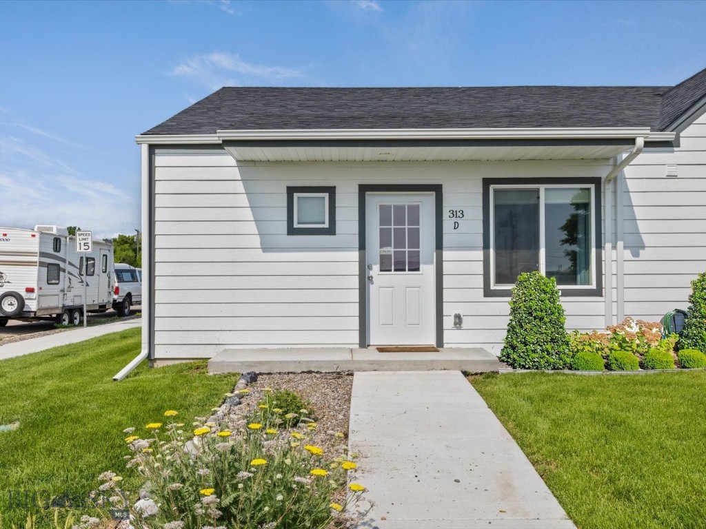 313 Miles Lane, Unit D Livingston, MT 59047 - Photo 1 of 1 End Condo in Brookstone Development - Plants to Right of Entry Virtually Staged