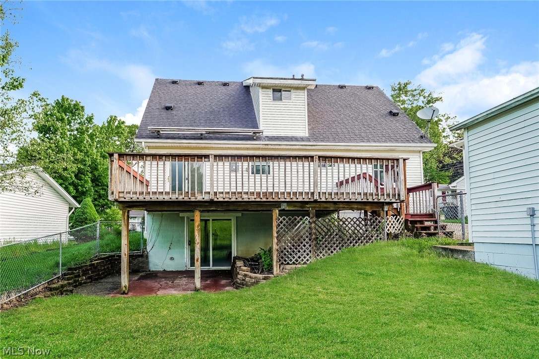 2508 Primewood Road Akron, OH 44305 - Photo 20 of 20 Rear view of house featuring a deck and a lawn