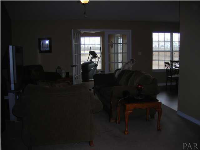 3372 North Simmons Road Jay, FL 32565 - Photo 7 of 24 View of the great room and Florida room beyond