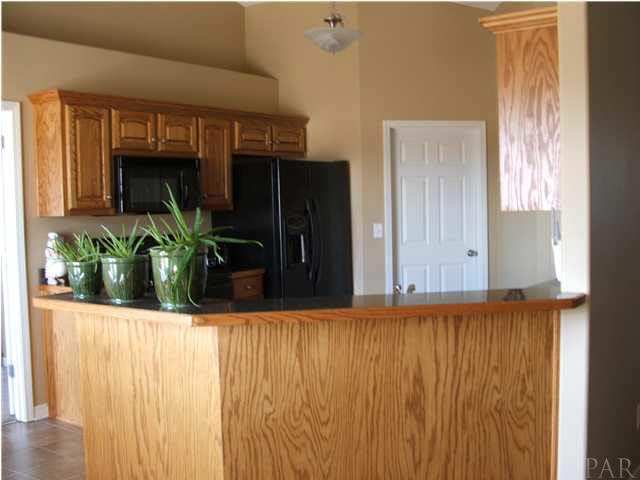 3372 North Simmons Road Jay, FL 32565 - Photo 9 of 24 Kitchen with plenty of upgraded wood cabinetry