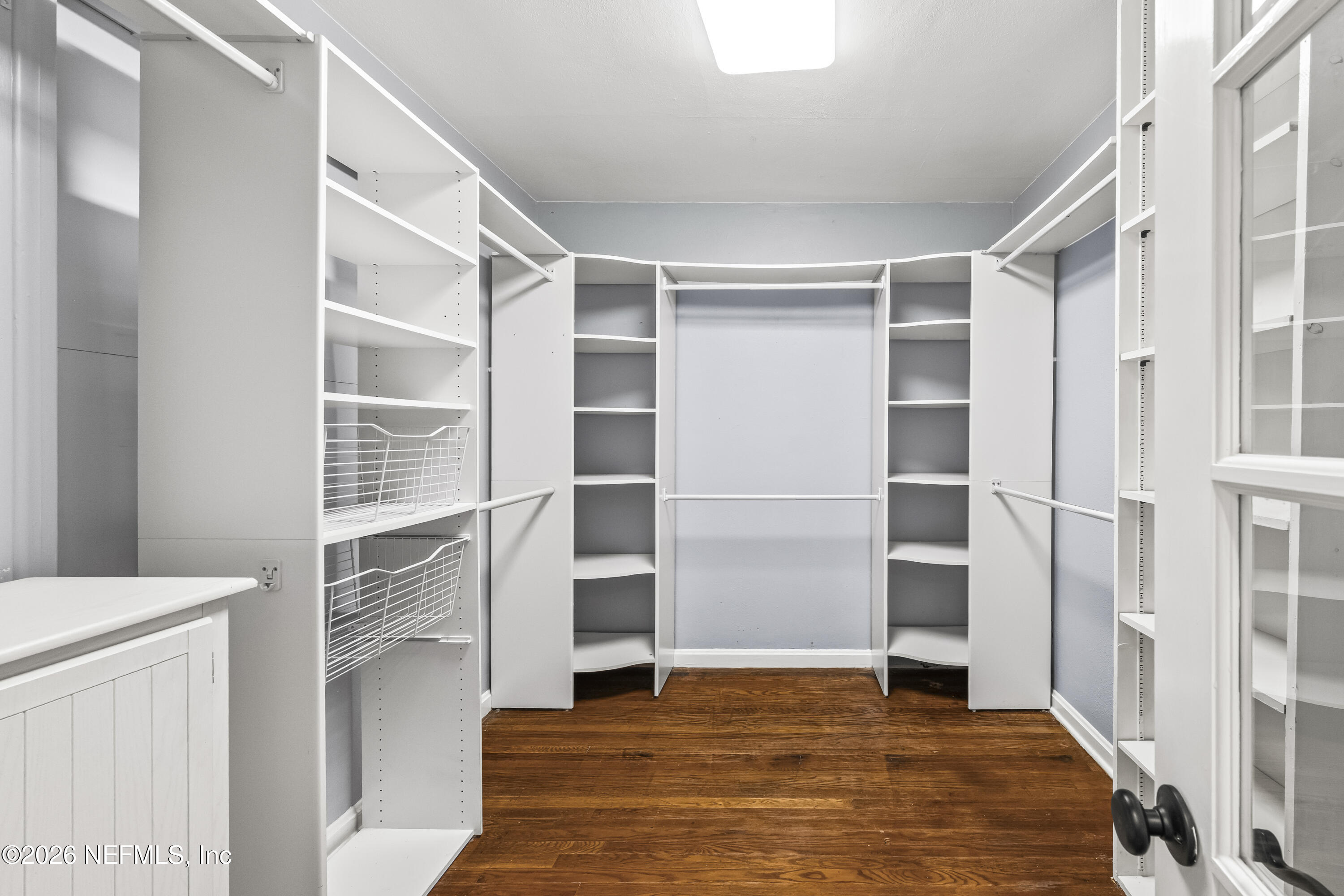 10612 Fort Caroline Road Jacksonville, FL 32225 - Photo 15 of 51 a view of walk in closet with empty racks