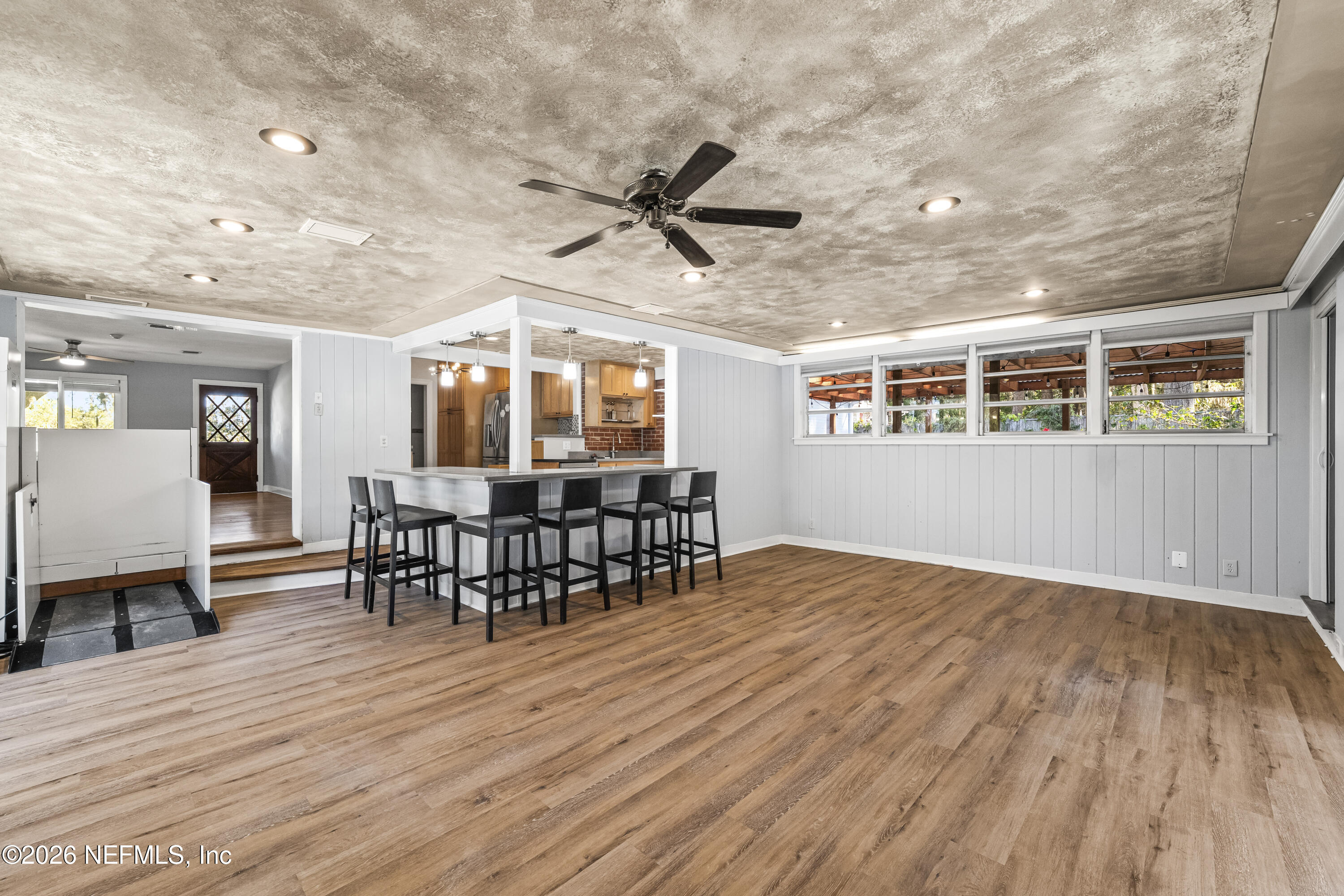 10612 Fort Caroline Road Jacksonville, FL 32225 - Photo 16 of 51 a view of a dining room with furniture window and wooden floor