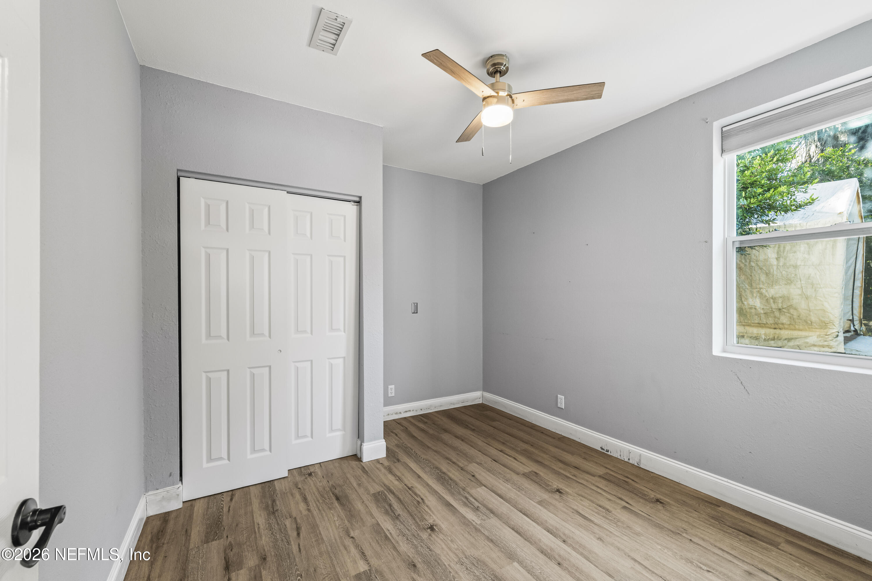 10612 Fort Caroline Road Jacksonville, FL 32225 - Photo 31 of 51 an empty room with a window