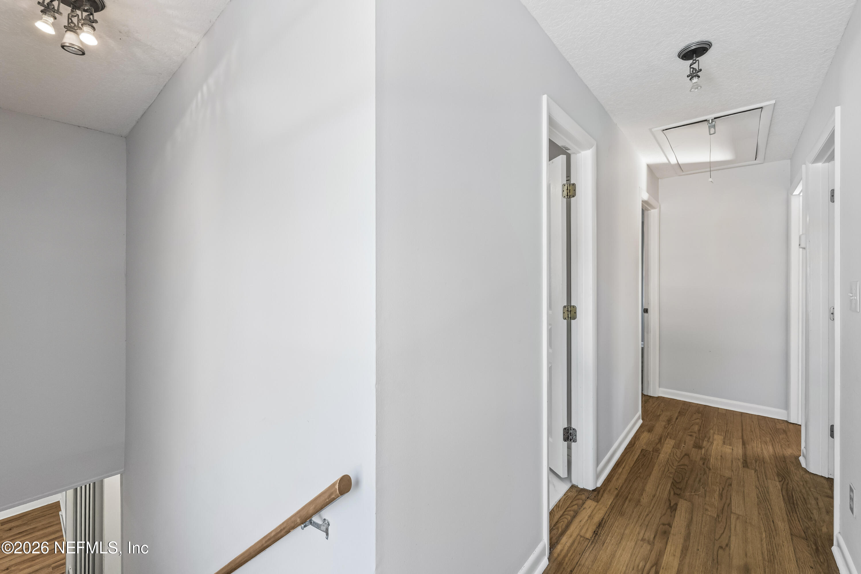 10612 Fort Caroline Road Jacksonville, FL 32225 - Photo 33 of 51 a view of a hallway with wooden floor